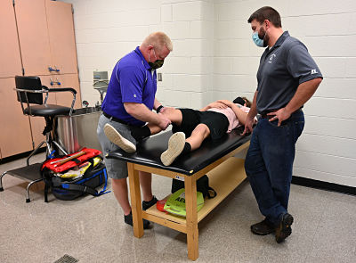 Picture of Ashe County High School Athletic Trainer Adam Elliott and Dustin Absher, director of rehabilitative services for Ashe Memorial Hospital
They have teamed up to form a new sports medicine program