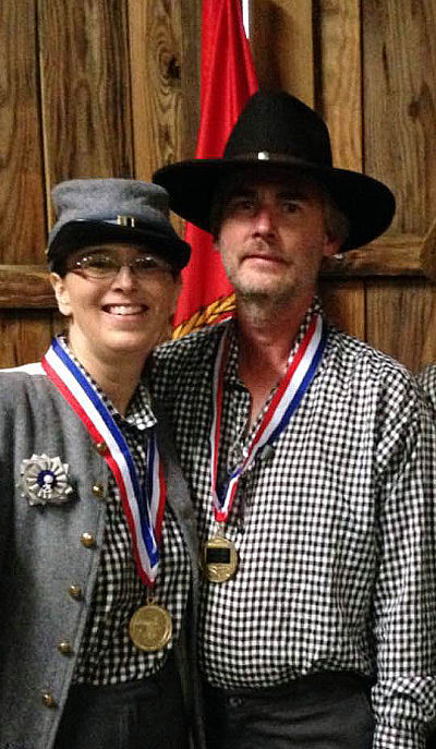 Cathy Martin, a patient financial counselor for Ashe Memorial Hospital, and her husband, Marty, enjoy skirmishing with the Iredell Blues.Cathy Martin and her husband Marty Martin wearing matching Civil War Attire