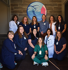 Ashe Women &amp; Children&apos;s Health Staff, smiling. There is nine females.