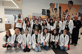 High school students pose for a photo during their visit to the Bowman Gray Center for Medical Education on the campus of Wake Forest University School of Medicine as part of their Camp Med experience.