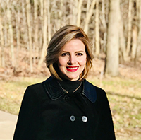 outdoor headshot of female physician